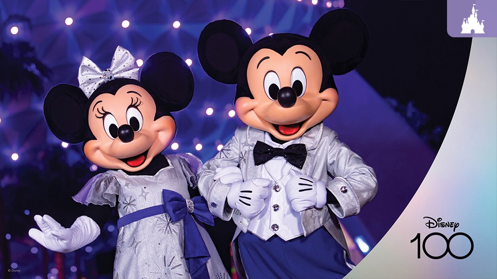 Mickey and Minnie commemorating the 100-year anniversary of the Walt Disney Company in front of the iconic Epcot ball, a timeless celebration of imagination and joy.